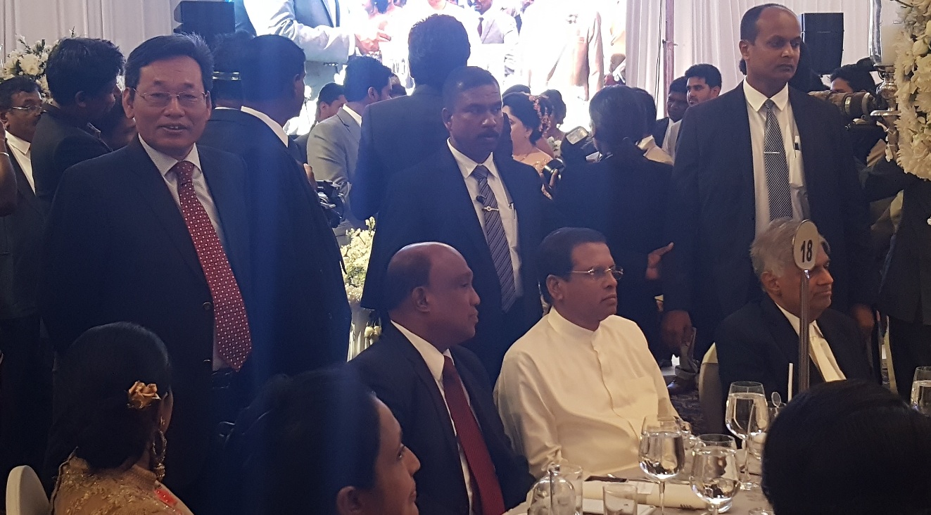The president of MNE is at a party with President, Prime Minister of Sri Lanka
